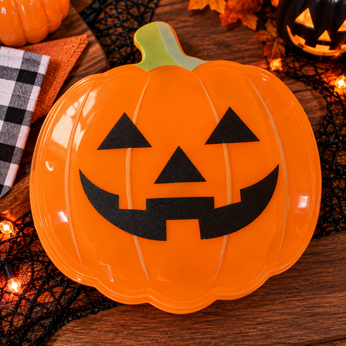 Orange jack-o'-lantern pumpkin container with lid on